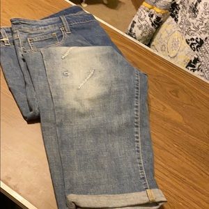 Distressed denim jeans.  Women’s plus size